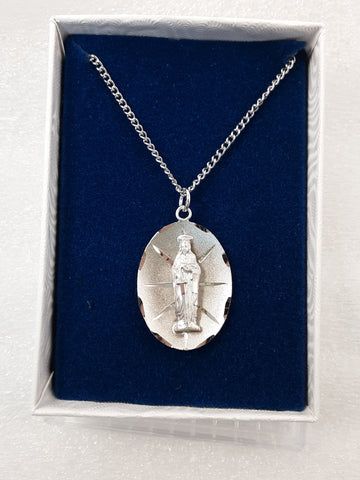 St Dymphna Sterling Silver Oval 3-D medal on Stainless Steel chain